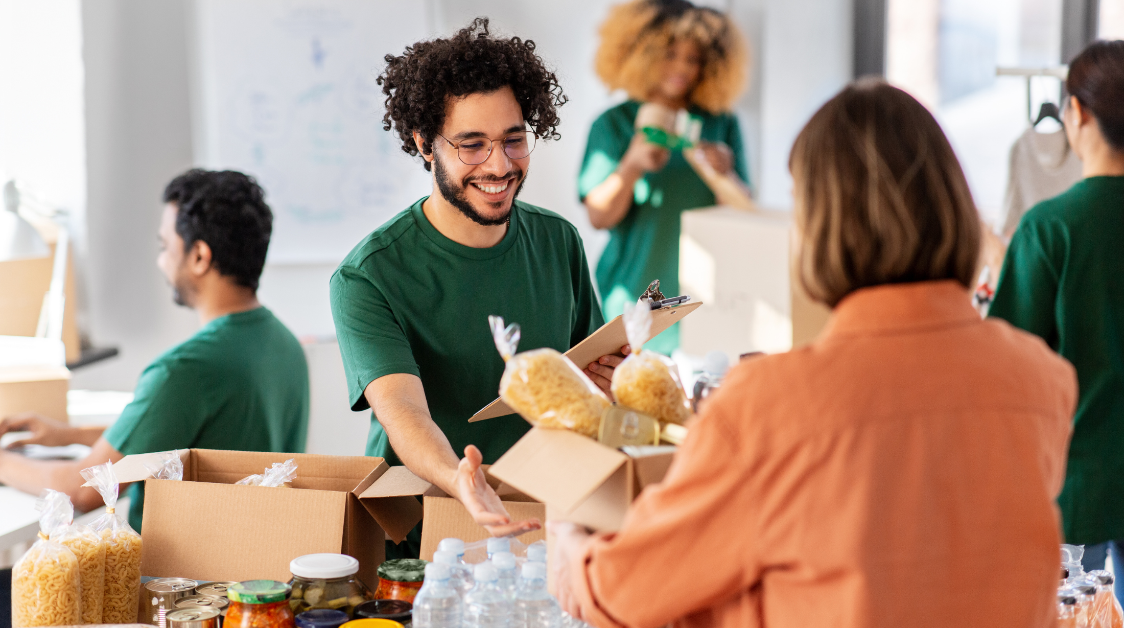 People sorting food donations